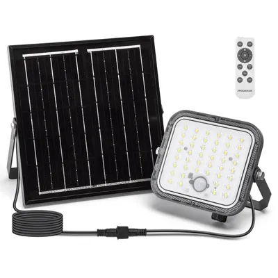 A solar-powered outdoor light with a separate solar panel and a remote control.