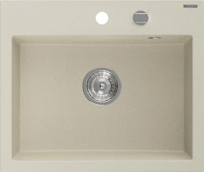 A top-down view of a beige granite kitchen sink with a silver drain.