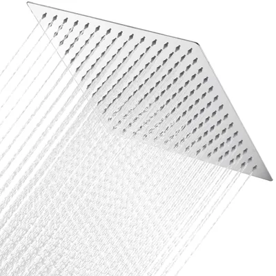 A square shower head with water spraying from it, against a white background.