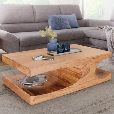 Produktbild von FineBuy Couchtisch Akazie Massivholz 120 cm · Rechteckiger Wohnzimmertisch mit geschwungener Form und Ablage · Handgefertigt & einzigartiges Design