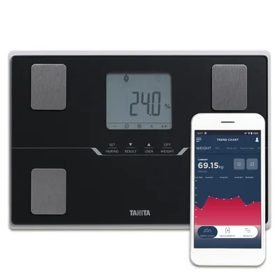 A smart scale and a smartphone displaying health data.