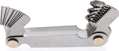 A set of metal thread gauges is shown against a white background.