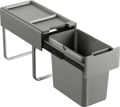 A gray pull-out trash can system with a lid, designed for under-cabinet installation.