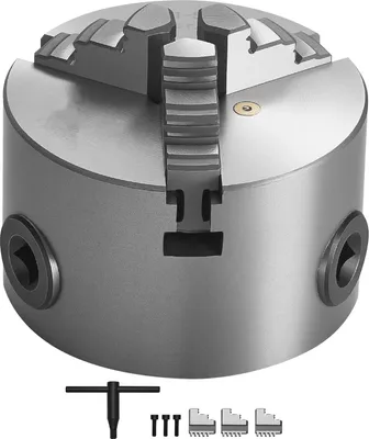 A three-jaw self-centering lathe chuck with a T-handle and three additional chuck jaws is shown against a white background.
