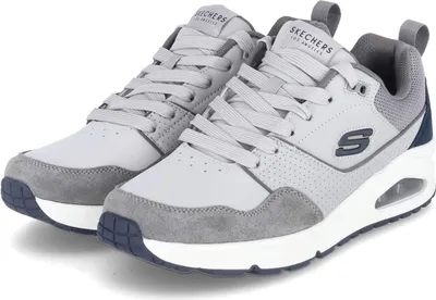 A pair of Skechers sneakers is shown from a slightly elevated side angle against a white background.