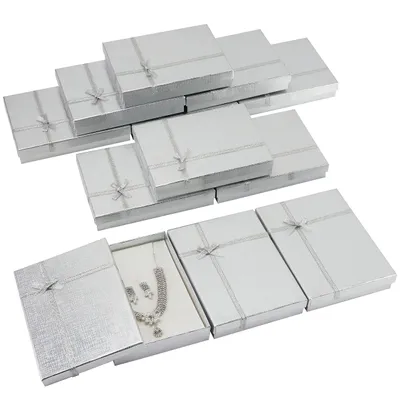 Zdjęcie produktu dla Kurtzy 12 szt Pudełka prezentowe w kolorze srebrnym do pakowania biżuterii - dł. 16 x szer. 12 x wys. 3 cm - Kartonowe pudełko prezentowe z kokardką i wstążką na pierścionki,