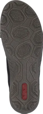 The image shows the sole of a black shoe.
