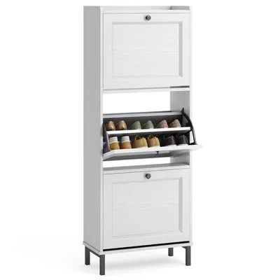 A white shoe cabinet with three flip-out drawers filled with shoes.