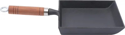 A black cast iron omelet pan with a wooden handle and a silver hanging loop, isolated on a white background.