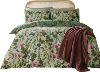 A floral bedding set with a brown throw blanket draped over it, set against a white background.