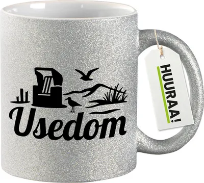 Produktbild von Huuraa Glitzertasse Usedom Strandmotiv 330ml Silber Keramik Kaffeebecher Geschenkidee