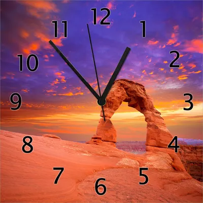 Produktbild von Wallario Design Wanduhr Steinbogen vor einem farbenfrohen Himmel in lila-rot aus Echtglas, Größe 30 x 30 cm