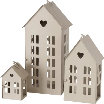 Three decorative house-shaped lanterns of varying sizes.