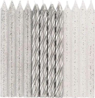 A close-up, top-down view of a collection of birthday candles.