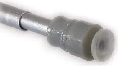 Close-up of a telescopic rod with a clear plastic end cap.