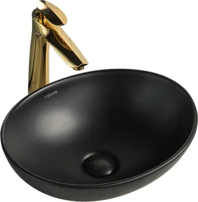 A black ceramic washbasin with a gold faucet against a white background.