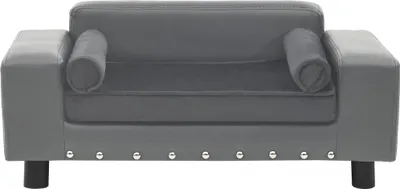 A studio shot of a gray dog sofa.