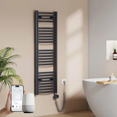 A bathroom scene featuring a dark gray electric towel warmer, a smartphone displaying a control app, and a smart speaker.