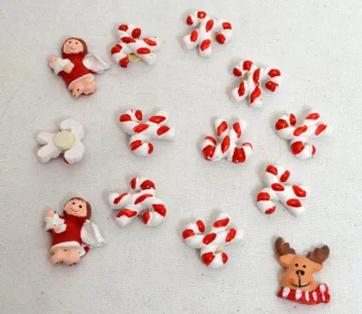 Produktbild von 10 Stück Streuteile sortiert Zuckerstange Elch 2-2,5 cm