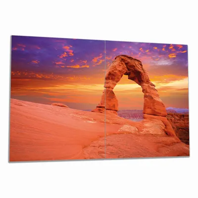 Produktbild von Wallario Herdabdeckplatte aus Glas, Größe 80 x 52 cm 2-teilig, Motiv Steinbogen vor einem farbenfrohen Himmel in lila-rot
