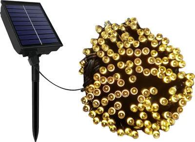 A solar panel connected to a string of warm white LED lights.