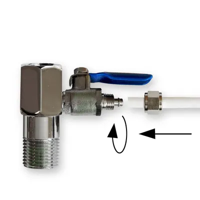 A close-up view of a water connection valve with a tube attached.