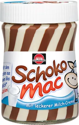A jar of chocolate spread with a cow illustration on the label.