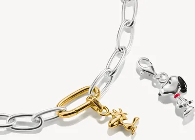 Immagine prodotto di Ciondolo Woodstock Connect PEANUTS con placcatura in oro 18 carati