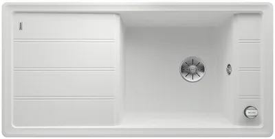 A top-down view of a white kitchen sink.