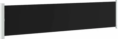 A black retractable side awning mounted on white posts.