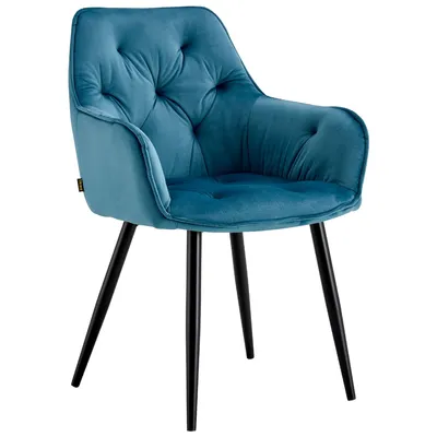 A teal velvet armchair with black metal legs is shown against a white background.