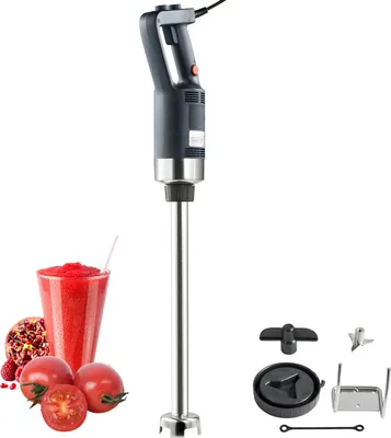 A commercial immersion blender with accessories, a glass of smoothie, and some fruits.