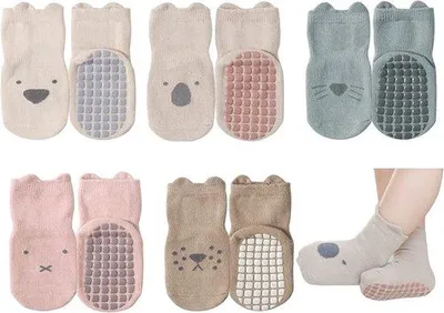 Immagine prodotto di Calzini antiscivolo per neonati, confezione da 5 paia - 5 colori - Morbidi - Per bambine, bambini e neonati