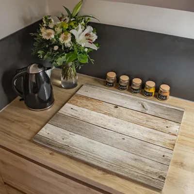 Produktbild von banjado Herdabdeckplatte einteilig 60,x52cm groß mit Gummi Abstandshalter, ESG Sicherheitsglas mit Motiv Graues Holz [HAP1 12172]