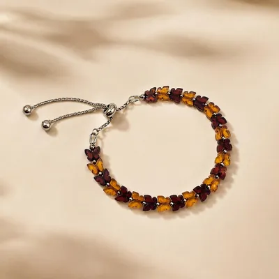 Produktbild von Bernstein Armband Schmetterlinge kirschrot und cognacfarben Damen, KI-generiertes Bild