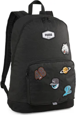 A black Puma backpack with various patches.