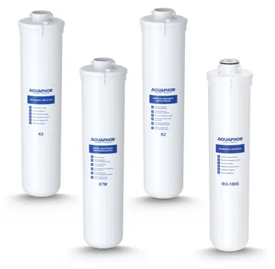 Four different water filter cartridges are displayed against a light gray background with shadows.