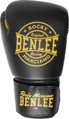 A black boxing glove with yellow branding.