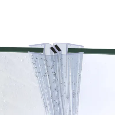 A close-up view of a clear plastic shower door seal with magnetic strips, attached to a glass surface.