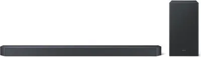 A soundbar and subwoofer are displayed against a white background.