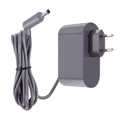 A gray power adapter with a coiled cable and a plug.