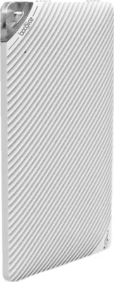 A white portable speaker with a textured surface.