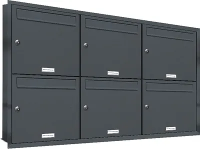 A wall-mounted mailbox system with six individual compartments.