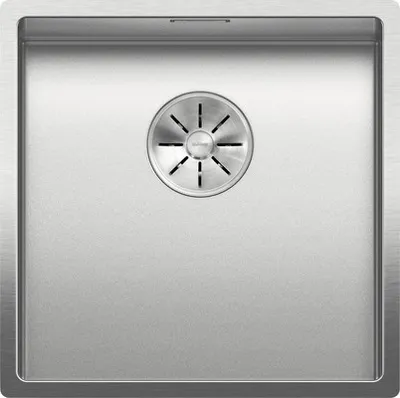 A top-down view of a stainless steel sink with a drain.