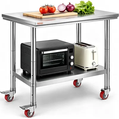 Image de Table de cuisine professionnelle en acier inoxydable, capable de supporter une charge de 300 kg