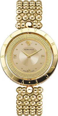 A close-up studio shot of a gold Versace watch.