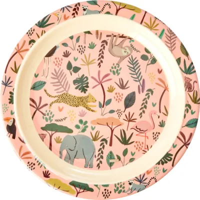 A round plate with a jungle-themed print.