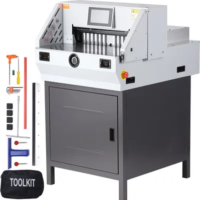 A VEVOR electric paper cutter is shown on a white background, with a set of tools and a toolkit bag to the left.
