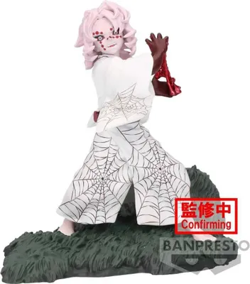 A figure of Rui from Demon Slayer, standing on a green, rocky base.