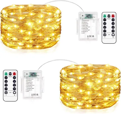 Imagen del producto de Guirnalda de luces - 2 x 10 metros - 100 LEDs - Funciona con pilas - Resistente al agua - Para uso en exteriores e interiores - Ideal para bodas, fiestas y Navidad